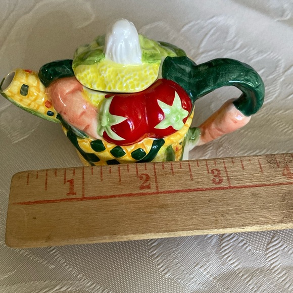 Tiny 3 1/2” vegetables in basket porcel, 2 pc. teapot w/ fitted lid.   $20 - Picture 4 of 5